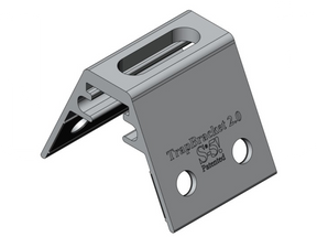 A 3D rendered image of the S5 TrapBracket KS1000RW 2.0, showing a metallic silver bracket with pre-punched holes and notches for mounting.